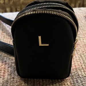 Elegant Black Leather Mini L Backpack